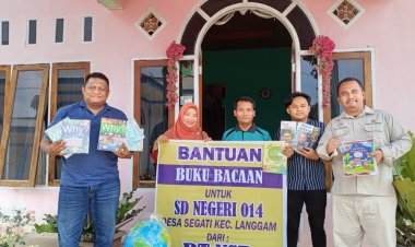 Memperingati Hari Anak Nasional, PT NSR Salurkan Bantuan Buku Di SDN 014 Segati