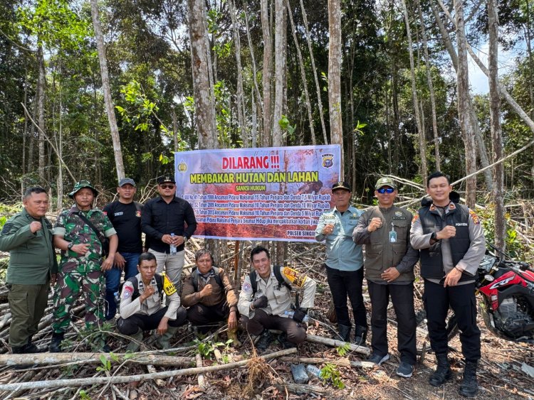 Polsek Singingi Hilir Gelar Patroli Gabungan, Pasang Spanduk dan Plang Larangan Membakar Hutan Serta Tanam Pohon di Kawasan Konservasi