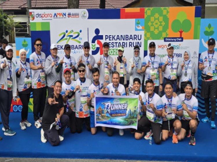 HUT Pekanbaru ke-242, Bapenda Hadir di Lestari Run dan Posko Pajak Daerah