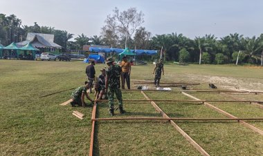 Jelang Penutupan TMMD ke-129 Kodim 0313/KPR, Satgas Gelar Persiapan Upacara di Lapangan Kantor Desa Pangkalan Terap